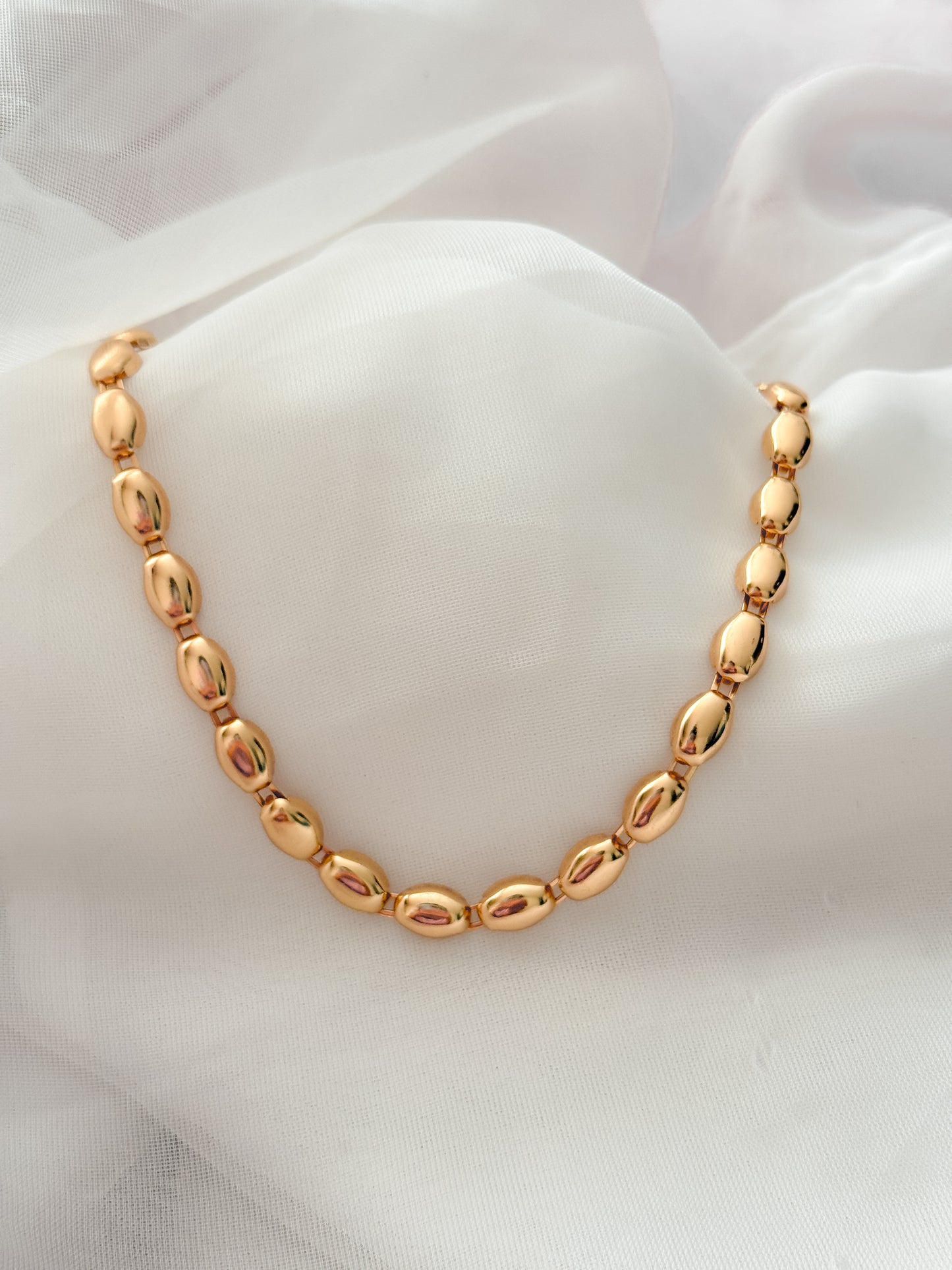 Cadena concha dorada