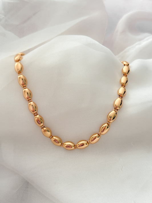 Cadena concha dorada