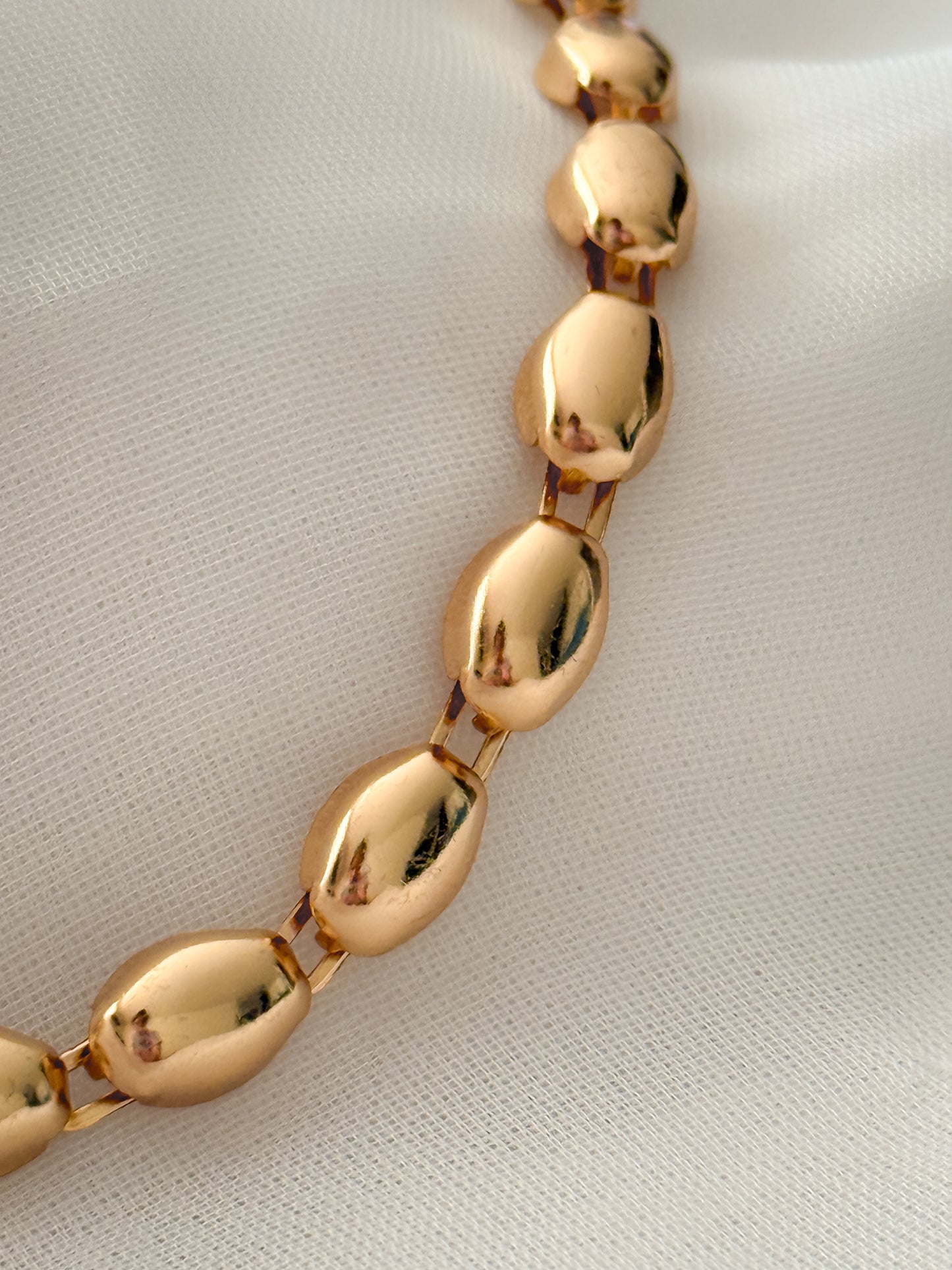 Cadena concha dorada