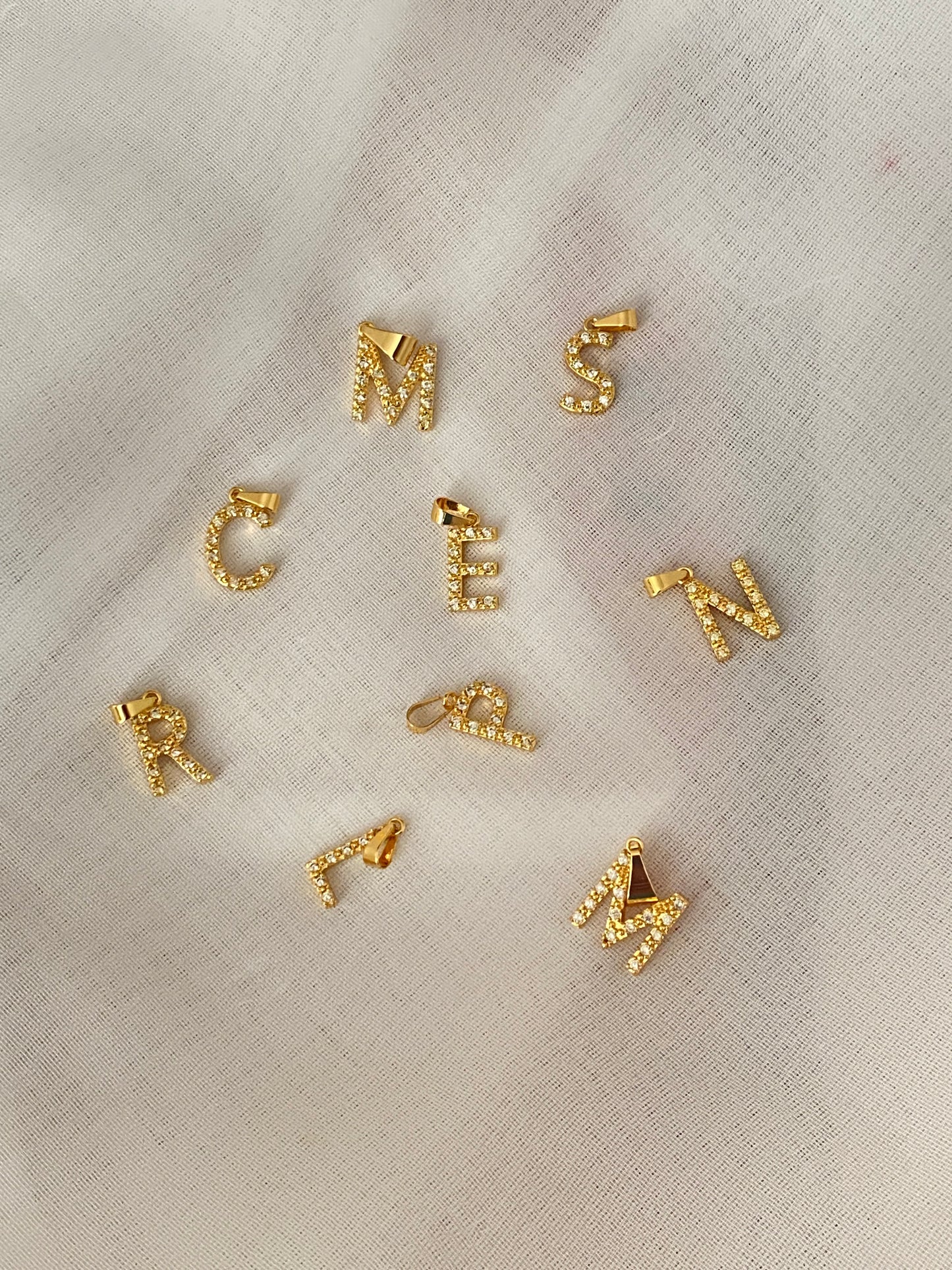 Dijes de letras